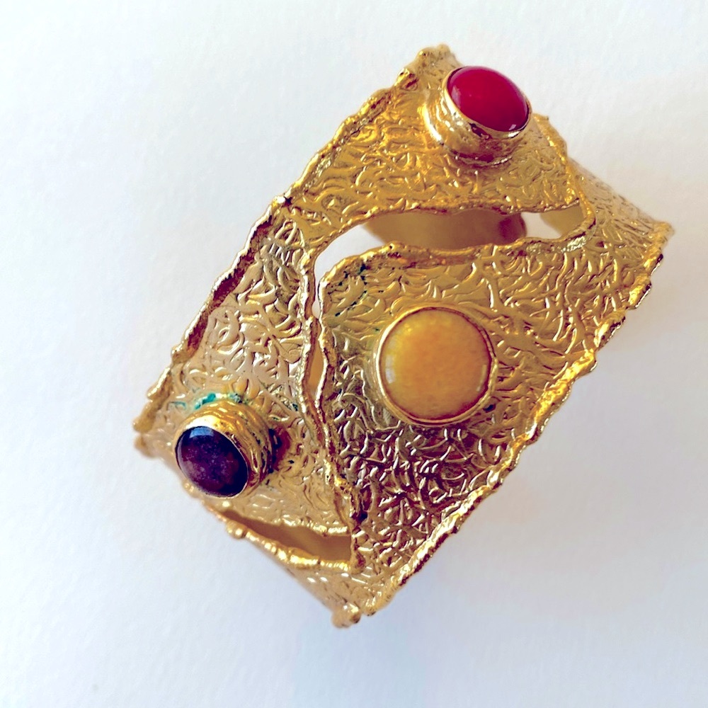 Elegant Gold Bracelet with Red, Yellow, and Purple Accents